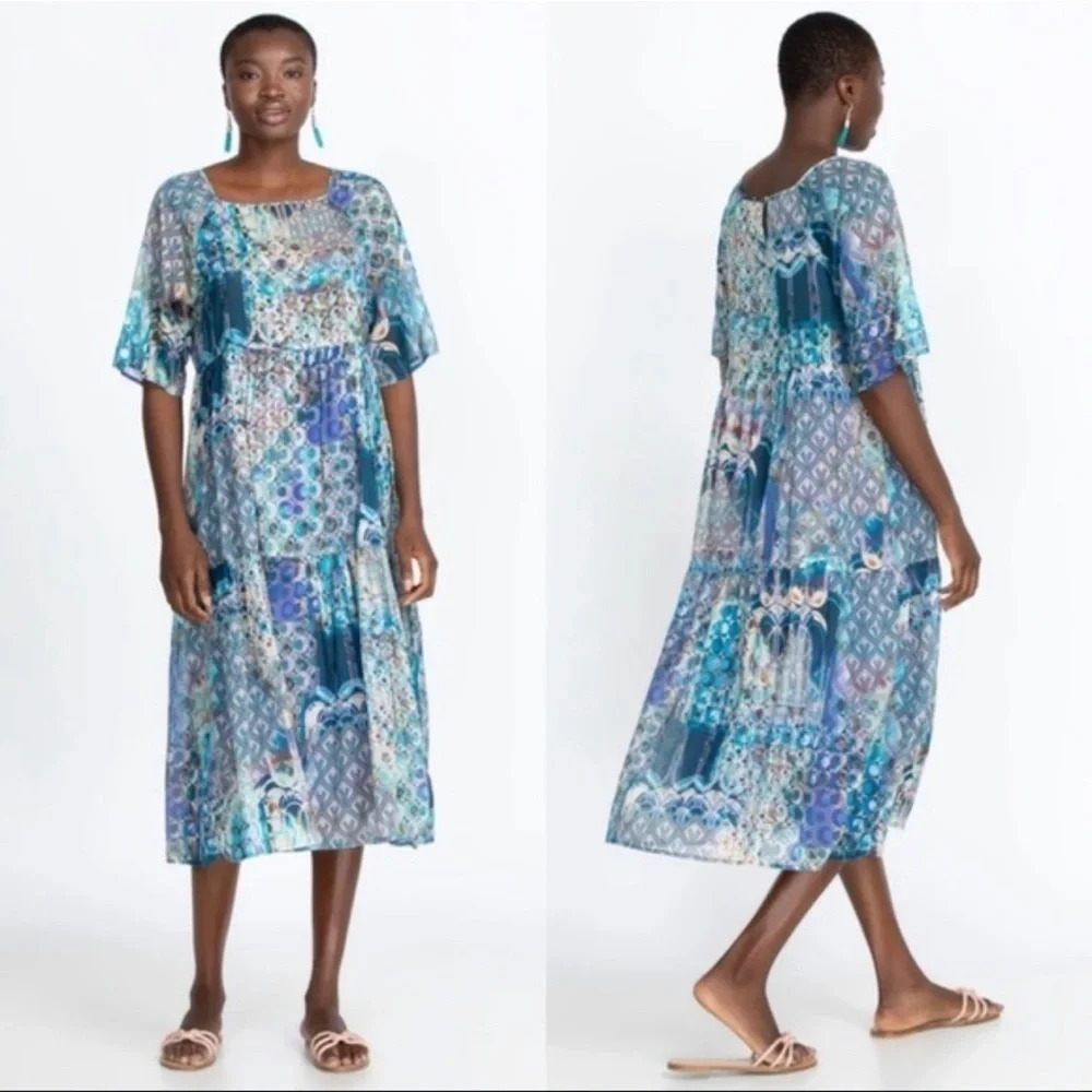 Johnny was blue multi klodi Raglan tiered dress.